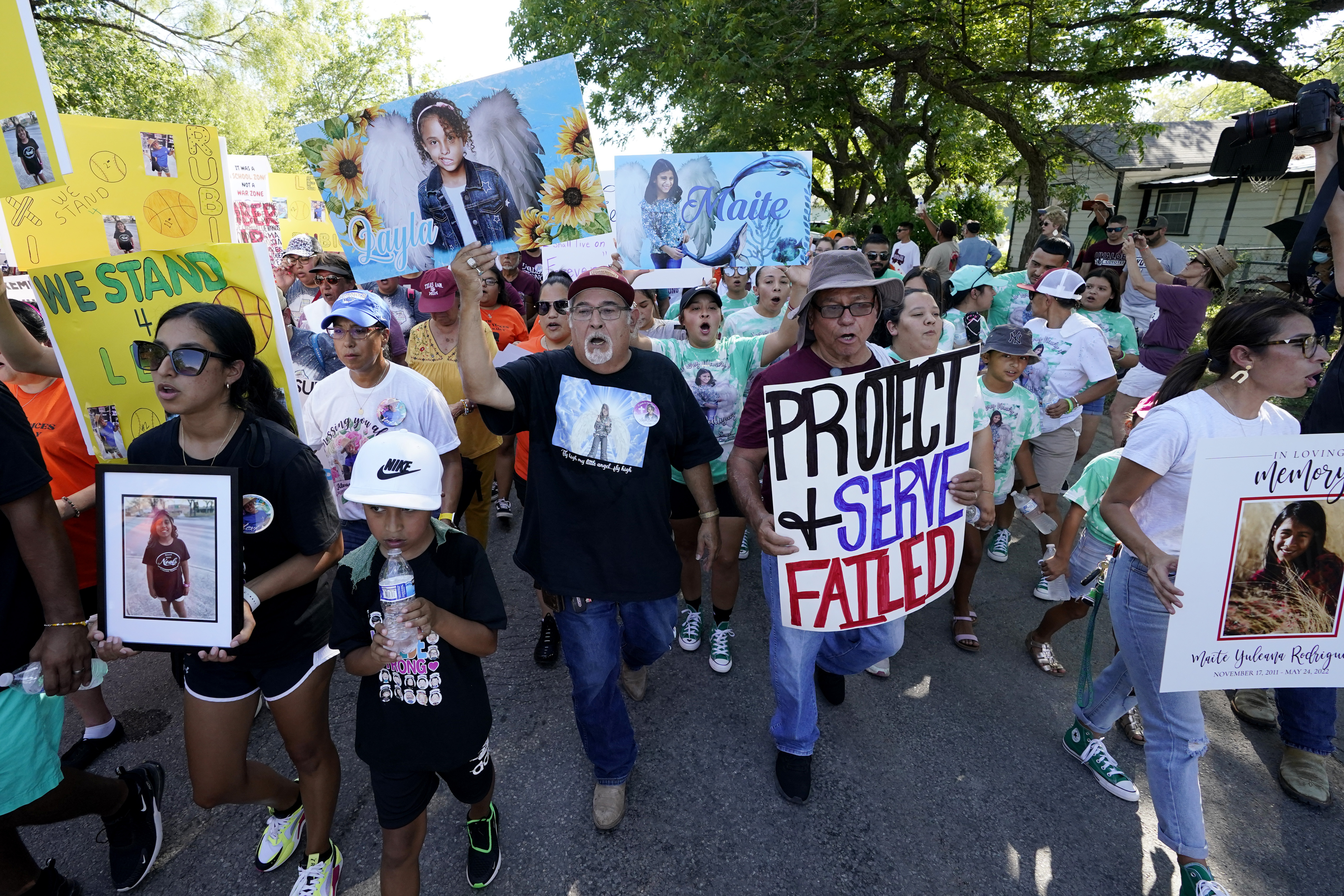 amily and friends of those killed and injured in the school shooting at Robb Elementary take part in a protest march and rally. Photo / AP