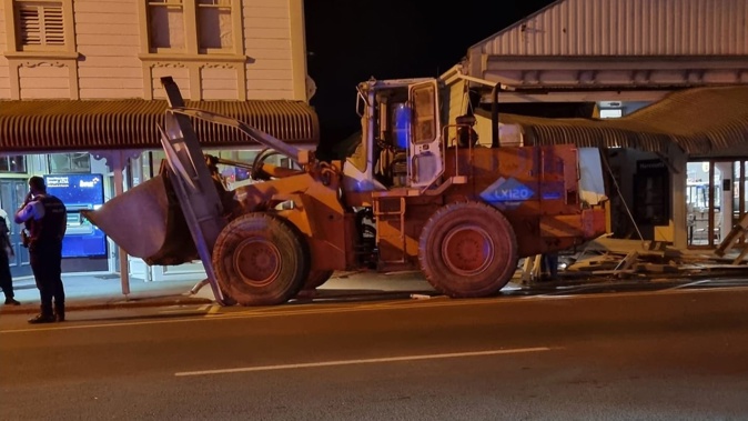 Kichener's Cafe in Martinborough, Wairarapa says the front of its building is seriously damaged after a digger ram-raided it. Photo / Kichener's