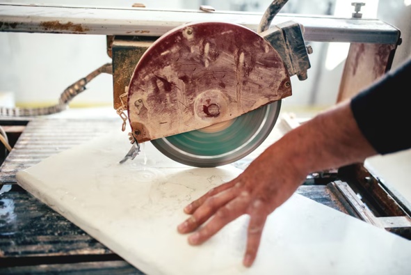 Engineered stone should not be cut dry, because of the risk silica dust poses when breathed in. Australia will from July ban all engineered stone, regardless of silica content levels. Stock photo / 123rf.com