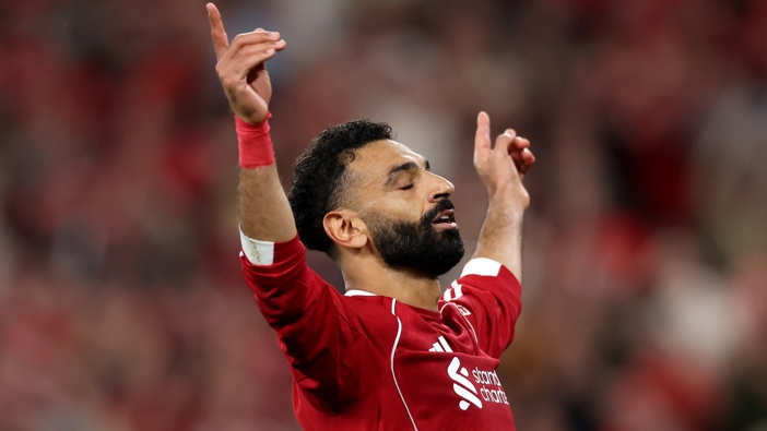 Mohamed Salah of Liverpool celebrates scoring his team's fourth goal during the Premier League match between Liverpool and Bournemouth at Anfield on August 15, 2025 in Liverpool, England. (Photo by Michael Steele/Getty Images)