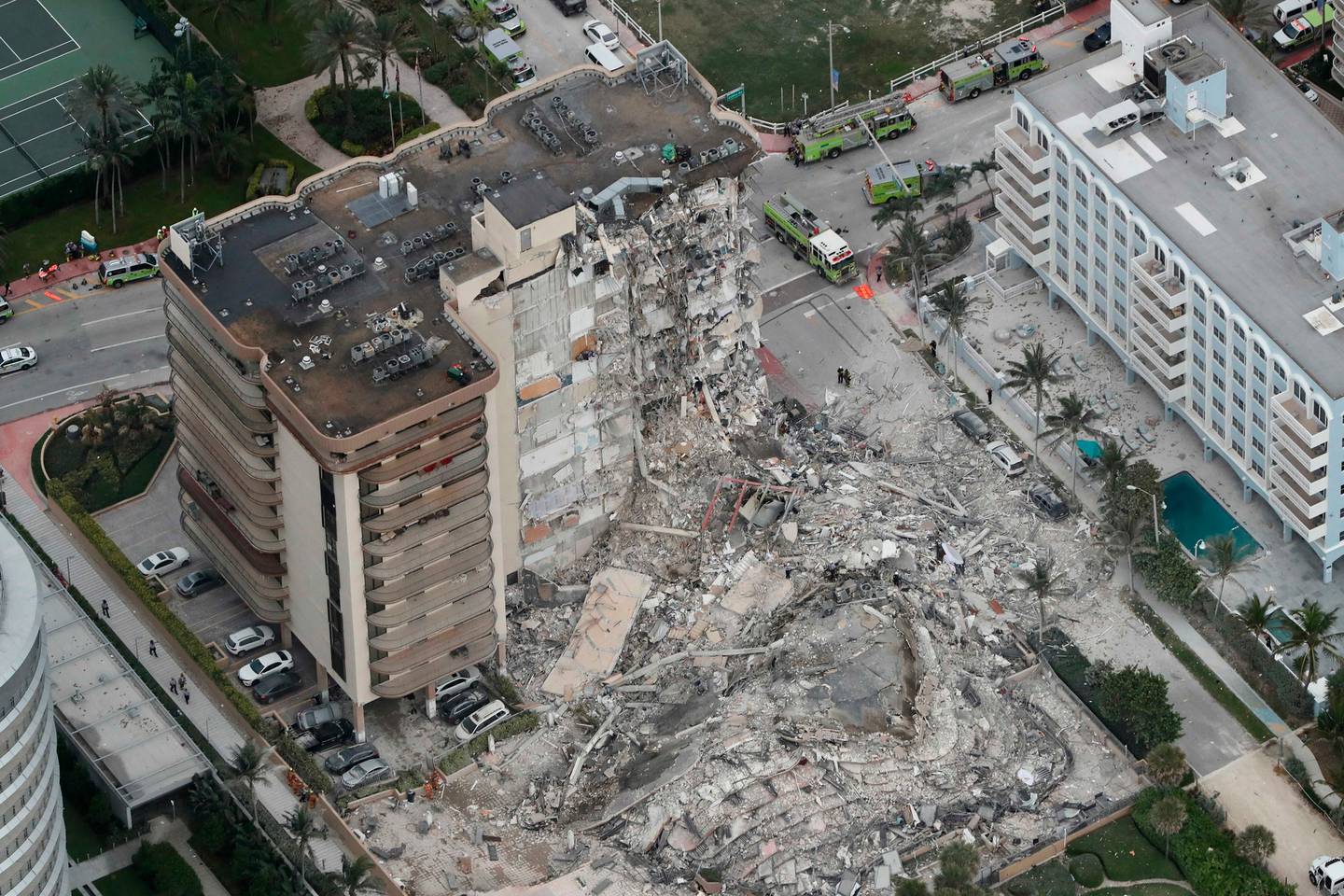 This aerial photo shows part of the 12-story oceanfront Champlain Towers South Condo that collapsed early Thursday, June 24, 2021 in Surfside, Florida. (Photo / AP)
