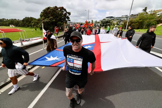 Hīkoi in solidarity with Ngāti Whātua and port workers taking place along Tamaki Drive, Auckland. NZ Herald photograph by Dean Purcell.