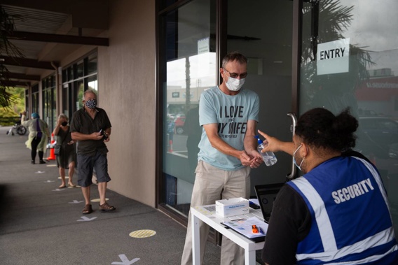 People arrive to be vaccinated at the Westgate Covid-19 Vaccination Centre in West Auckland. (Photo / Sylvie Whinray)