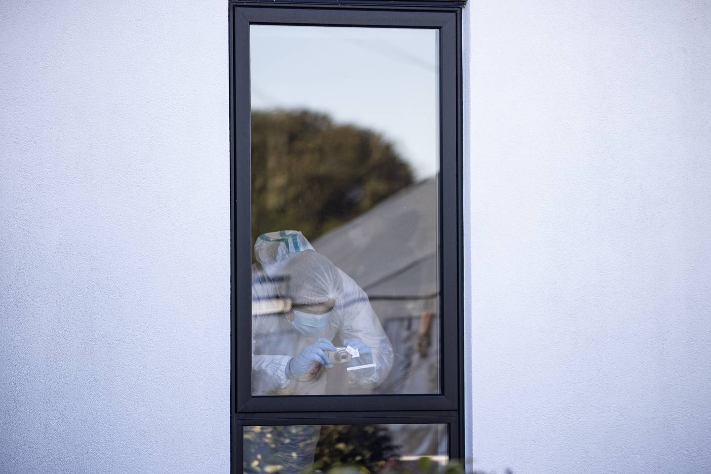 Forensic staff are investigating a home on Trevor St, Hornby in relation to missing woman Yanfei Bao. Photo / George Heard