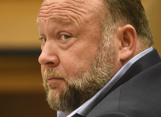 Infowars founder Alex Jones appears in court to testify during the Sandy Hook defamation damages trial. Photo / AP