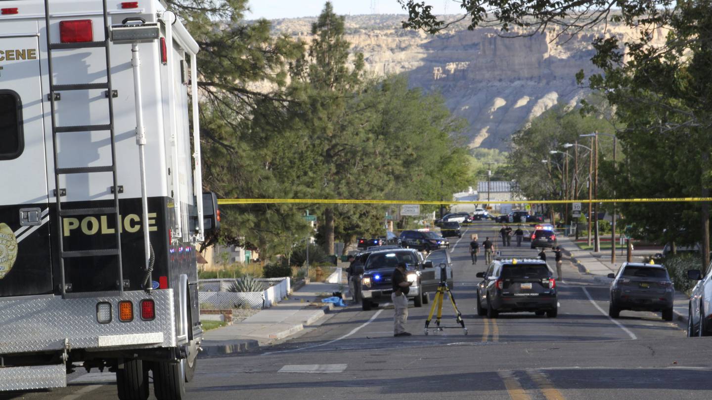 Investigators work along a residential street following a deadly shooting Monday, May 15, 2023, in Farmington, New Mexico. Photo / AP