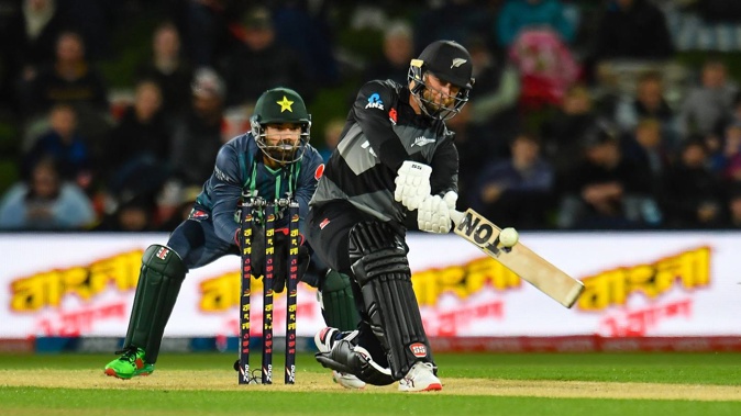 Devon Conway of the Black Caps with Muhammad Rizwan of Pakistan. Photosport