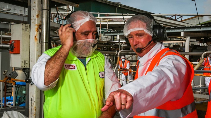 US Ambassador Tom Udall, right, visits the Watties factory and talks with worker Rio Savage. (Photo / Paul Taylor)
