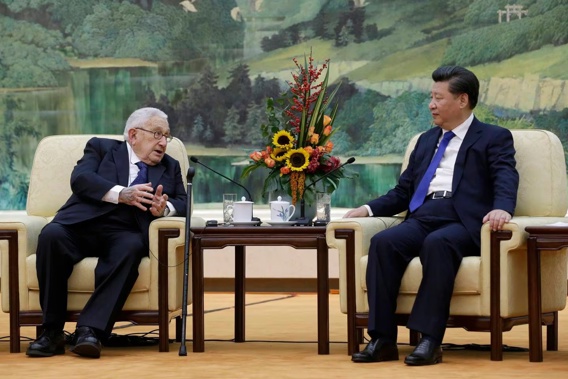 Henry Kissinger, who led the China-US Track Two Dialogue, chats with China's President Xi Jinping during a meeting in Beijing in 2015. Photo / AP