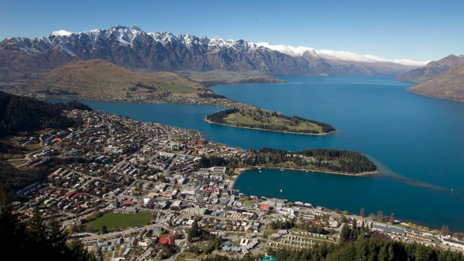 The Remarkables pictured behind Queenstown. Photo / Mark MItchell
