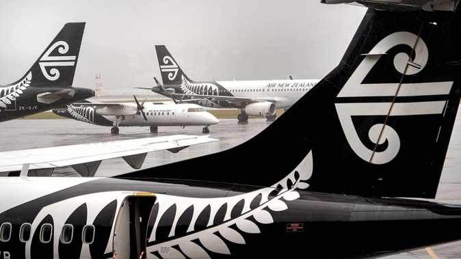 Air New Zealand planes stack up as Cyclone Gabrielle hits the North Island. Photo / Marty Melville