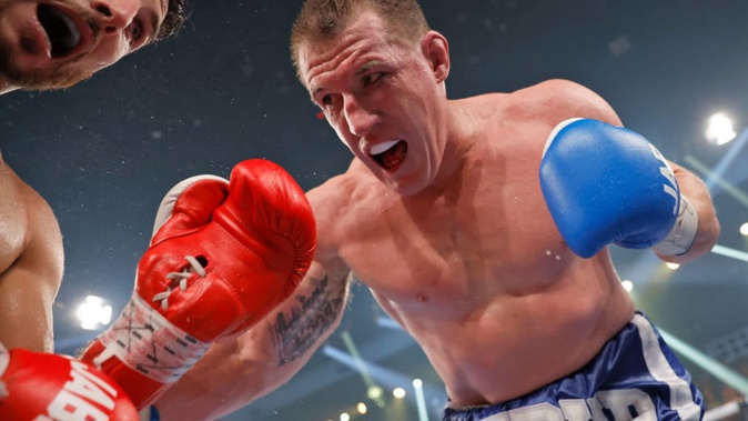 Paul Gallen throws a punch during the Australasian Heavyweight Title bout against Kris Terzievski. (Photo / Getty)