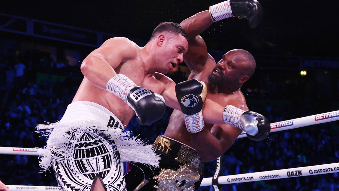 Joseph Parker knocks down Derek Chisora. (Photo / Photosport)