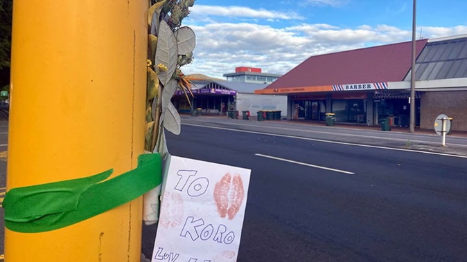 A note and flowers at the scene of a fatal incident involving a mobility scooter and a motorcycle on Tuesday. Photo / Laura Smith