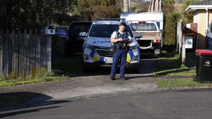 Police at the scene of a homicide inquiry on Aaron Place in Brookfield, Tauranga. Photo / Alex Cairns