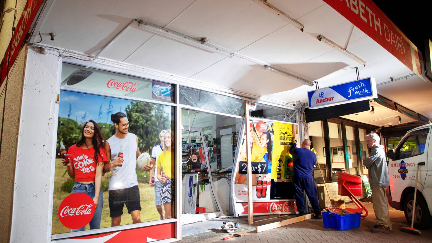 Emergency glass was installed after thieves broke into Elizabeth Dairy in Belmont last night. Photo / Hayden Woodward