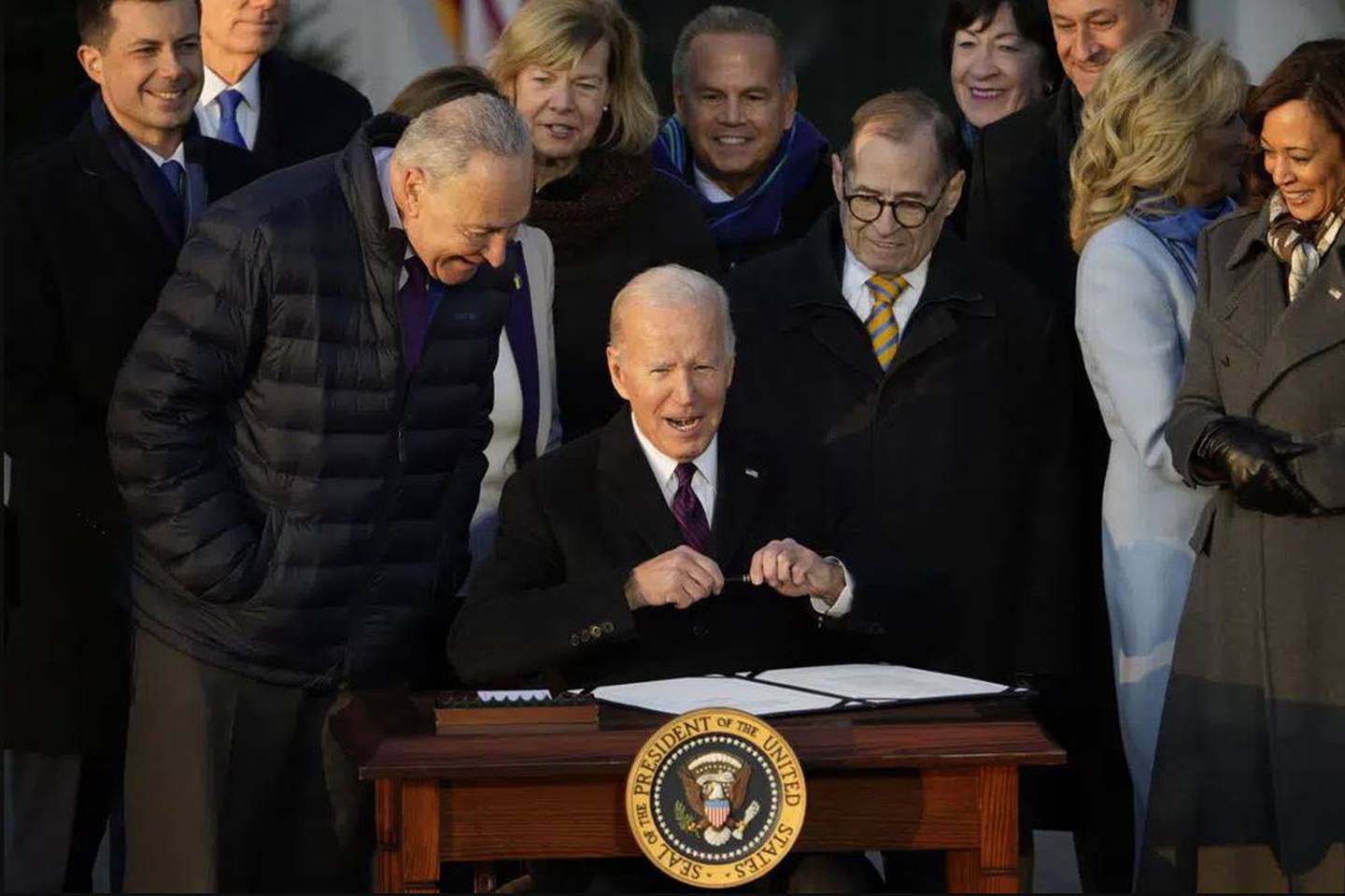 US President Joe Biden signs the Respect for Marriage Act into law on the South Lawn of the White House in Washington. Photo / AP