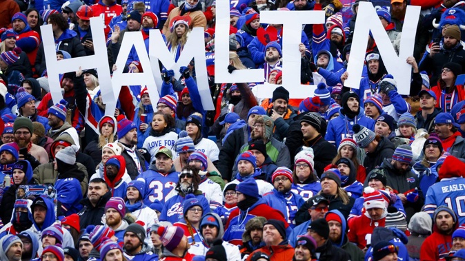 Fans hold a sign in support of Buffalo Bills safety Damar Hamlin during the second half of an NFL football game against the New England Patriots. Photo / AP