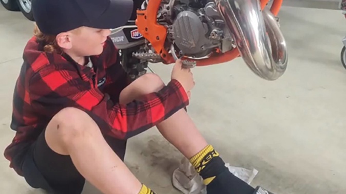 Ryder Ferregel, 10, has been missing since a boat with five people on board capsized near Clarks Beach. Photo / Supplied
