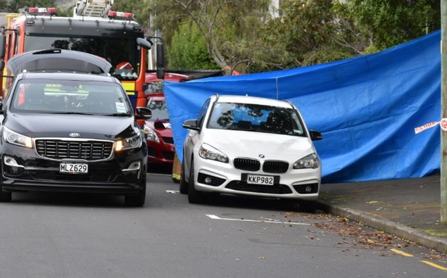 The scene at St Vincent Ave in Remuera where an elderly woman was found dead in her car. (Photo / Darren Masters)