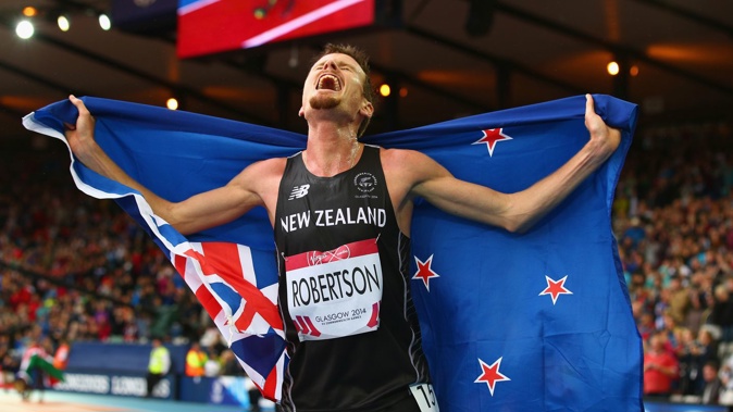 Zane Robertson celebrates after winning bronze in the men's 5000m at the Glasgow 2014 Commonwealth Games. Photo / Getty Images