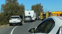 The crash happened about 1.30pm on Saturday, involving three vehicles.