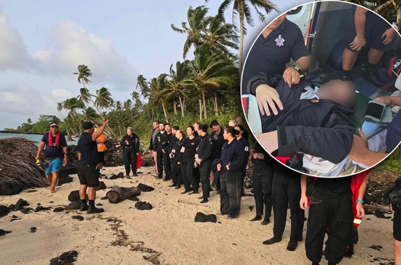 New Zealand Defence Force personnel on shore after being rescued from the sea when the ship Manawanui ran aground in Samoa. Photo / Samoa Fire and Emergency Services Authority