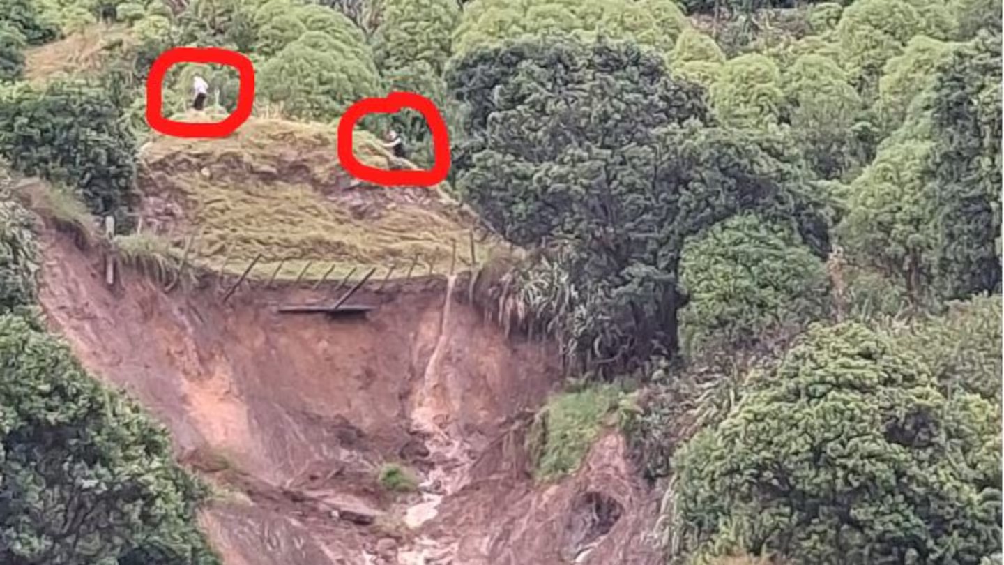 Walkers seen perching precariously above slip nearly two hours after local called 111