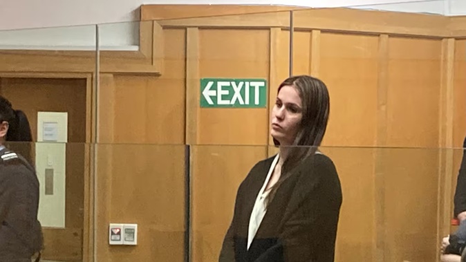 Jessica Mulford in the dock of the High Court at Hamilton on Monday. She is defending charges of injuring with intent to injure and murder of two-year-old Harlee-Rose Niven in Hamilton. Photo / Belinda Feek