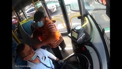 An irate passenger punches an Auckland bus driver in the head during an incident on Queen St last month. (Photo / Supplied)
