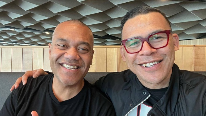 Efeso Collins and community leader Dave Letele pose together in 2022. Photo / Dave Letele