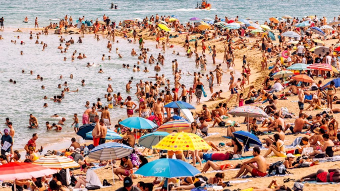 Local council warns visitors who hog spots on the beach for long hours face $400 fines. Photo / Getty Images