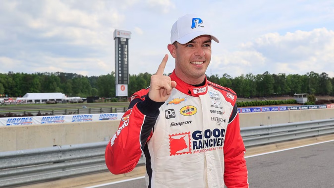 Scott McLaughlin celebrates his pole position in Alabama. Photo / Getty Images