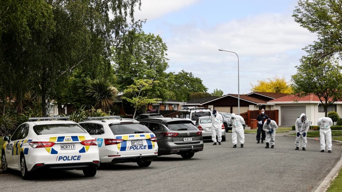 Police forensic team search Matson Avenue Christchurch after a teenager was shot and killed nearby. (Photo / George Heard)