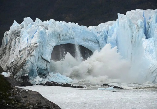 Chunks of ice break off the Perito Moreno Glacier, in Lake Argentina, at Los Glaciares National Park, near El Calafate, in Argentina's Patagonia region, March 10, 2016. As glaciers melt and pour massive amounts of water into nearby lakes, 15 million people across the globe live under the threat of a sudden and deadly outburst flood, a new study finds. (AP Photo/Francisco Munoz, File)