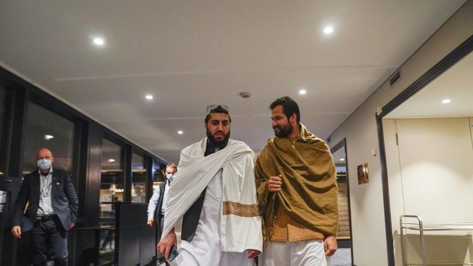Taliban delegate Shafiullah Azam (left), Taliban vice director for economic co-operation, Ministry of Foreign Affairs. Photo / AP