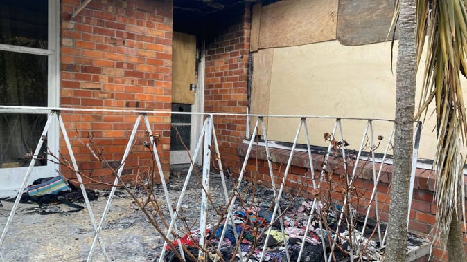 Police were called to the Te Atatū house about 2.30am on Sunday, August 6, after a Molotov cocktail was thrown through a bedroom window. Photo / Raphael Franks