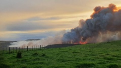 The fire was advancing towards SH1 from Te Werahi Beach last night, just south of Te Rerenga Wairua/Cape Rēinga. Photo / Ngāti Kuri