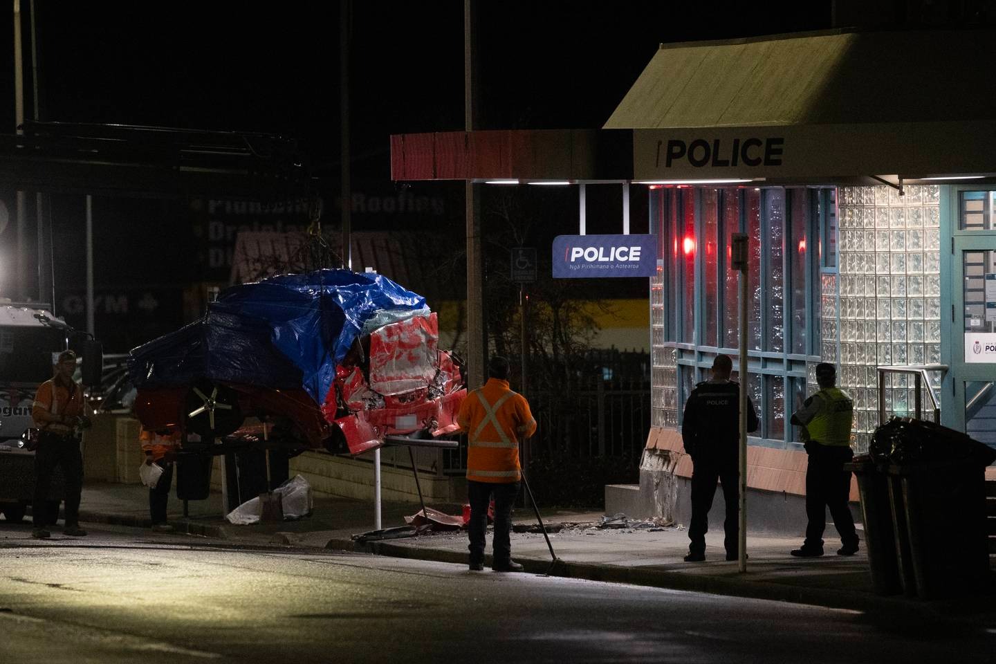 Man dies after crashing car into police station at speed