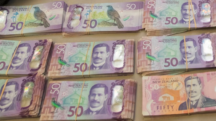 The money found in the roof space of a couple's home was mainly in bundles of $50 notes. File photo / Mark Mitchell