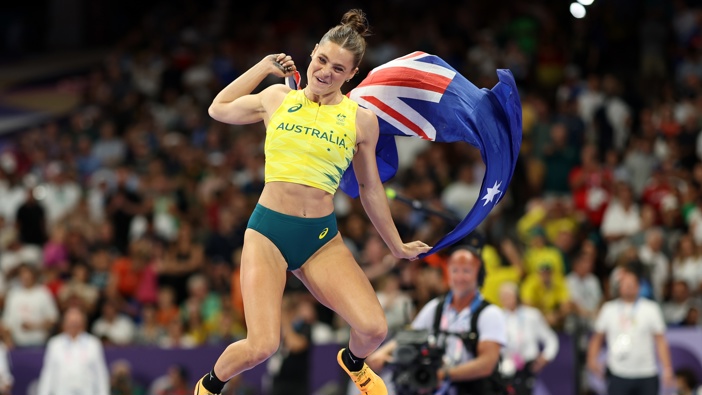 Nina Kennedy of Team Australia celebrates winning the gold medal after competing in the Women's Pole Vault Final on day twelve of the Olympic Games Paris 2024 at Stade de France on August 07, 2024 in Paris, France. (Photo by Cameron Spencer/Getty Images