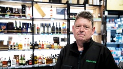 Lunn Ave Liquorland owner Andrew Barr after this morning's break in at his store. (Photo / Hayden Woodward)