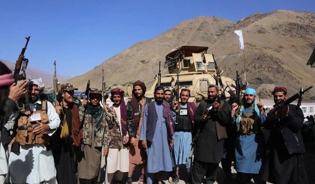 Taliban members pose for a photo after they took over Panjshir Valley. Photo / Getty Images