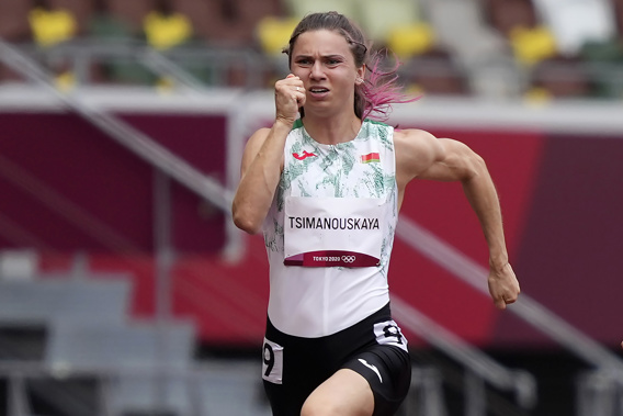 Krystsina Tsimanouskaya, of Belarus, runs in the women's 100-meter run at the 2020 Summer Olympics, Friday, July 30, 2021. (Photo / AP)