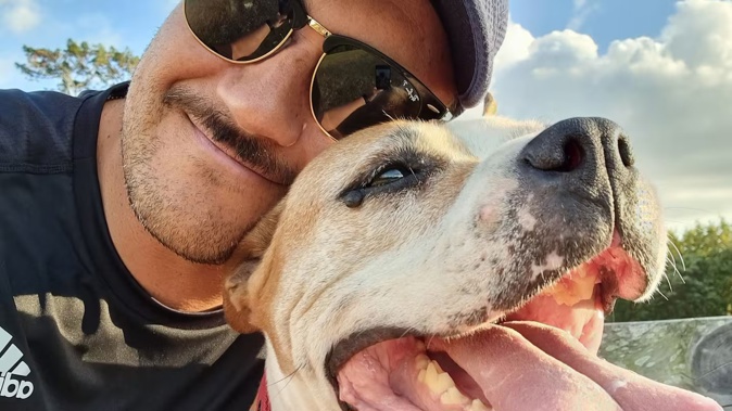 Robert Telford with Suki, who has been the focus of a protracted legal case after she bit another dog in an Auckland park. Suki died last year before her case helped resolve a grey area of the law. Photo / Robert Telford