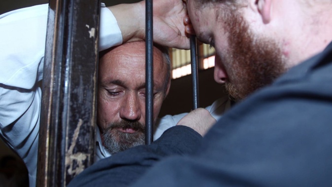 Convicted drugs smuggler Antony de Malmanche with his son Shaun de Malmanche after he was sentence in Bali. Photo / AP