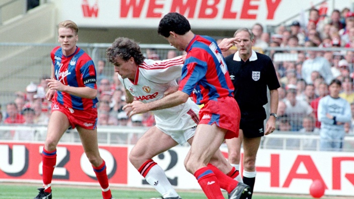 Manchester United's Mark Hughes (on ball) weaves his way past Crystal Palace's Gary O'Reilly (right) in the FA Cup final at Wembley. (Photo by PA Images via Getty Images)