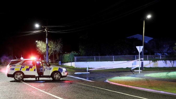 An area is cordoned off after a police officer was shot in Hamilton overnight. (Photo / Hayden Woodward)