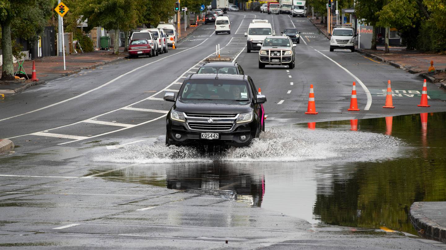 Surface flooding on Great North Rd, Western Springs, after torrential rain caused flooding in the Auckland region. (Photo / Hayden Woodward)