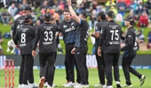 The Black Caps celebrate Jacob Duffy's third wicket in the fifth T20 against the West Indies in Dunedin. Photo / Photosport